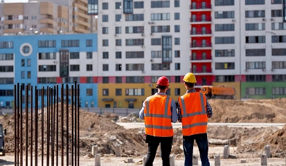 AppMatic Tech engineers reviewing a completed residential construction block