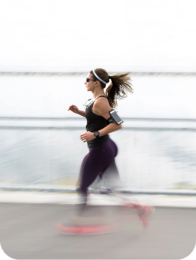 Runner tracking pace and distance on a fitness app built by AppMatic Tech